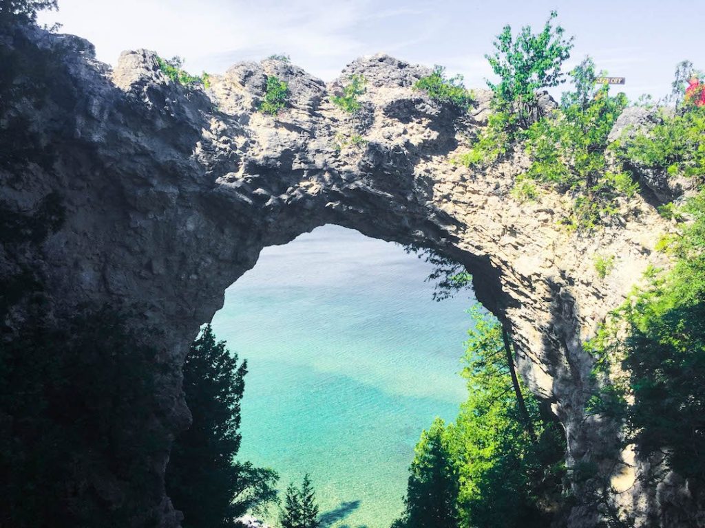 Arch Rock on Mackinac Island with crazy blue water behind it