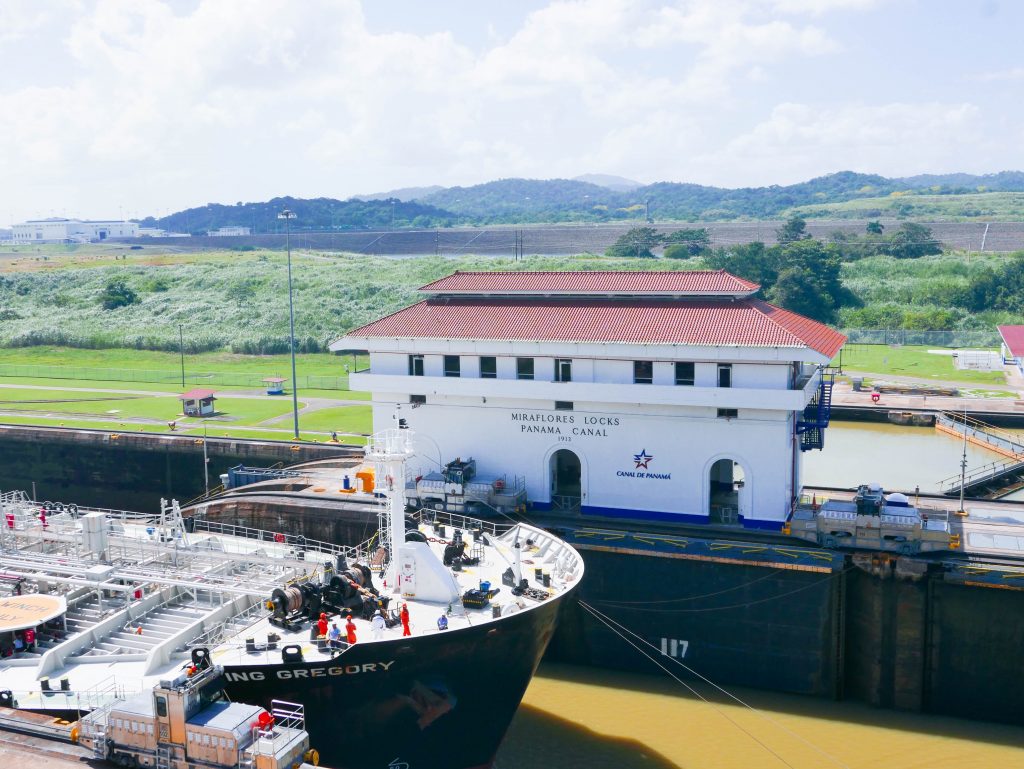 A boat passing through Miraflores Locks on the Panama Canal in Panama City