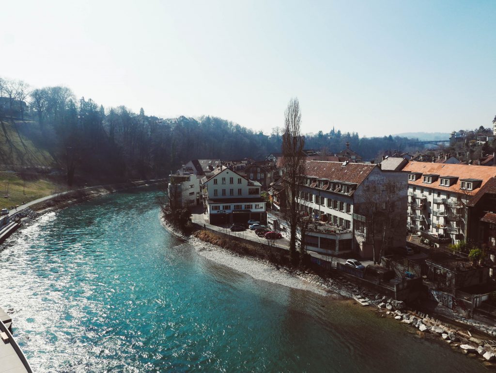 a blue river in bern, switzerland on my first solo trip