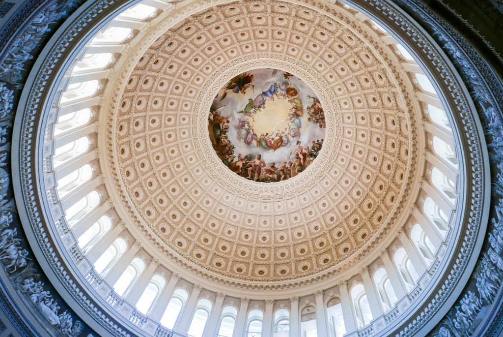 Looking up at the painted inside of the dome in the Capitol Building, Washington DC