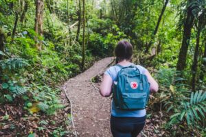 Addie hiking with her backpack