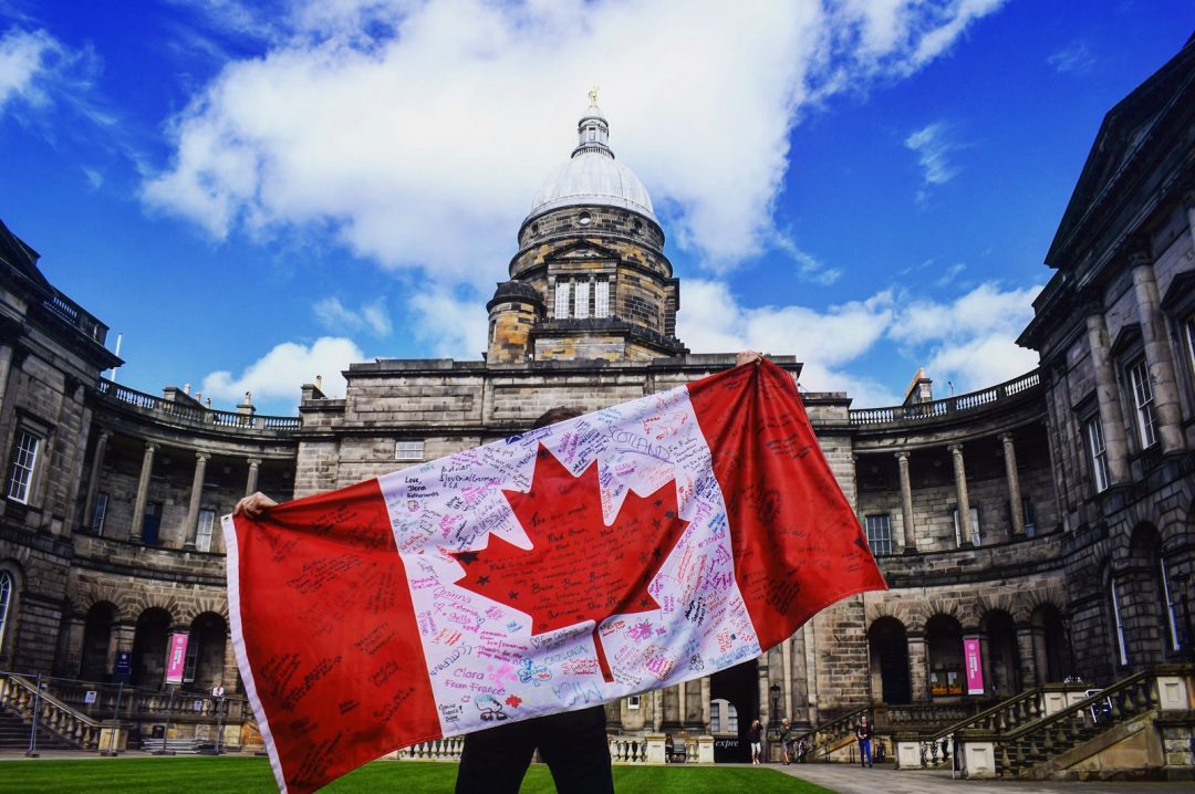 The Canadian flag, covered in signatures after studying abroad in Ediburgh