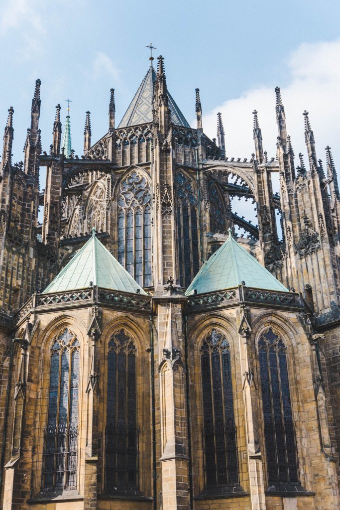A tight shot of the outside of the intricate gothic St Vitus Cathedral at Prague Castle