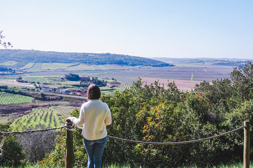 Addie looking out at the countryside of Obidos, Portugal