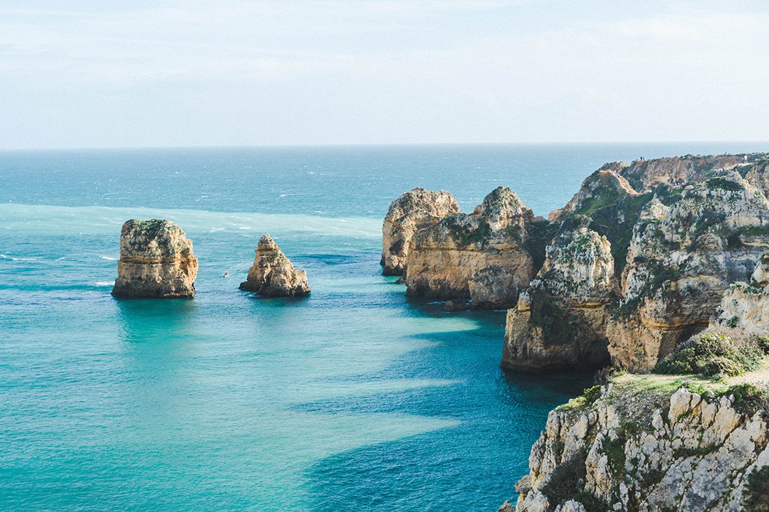 Cliffs in Lagos, portugal at the end of our hike where we reached some of the best beaches in Lagos, Portugal during 2 weeks in Portugal