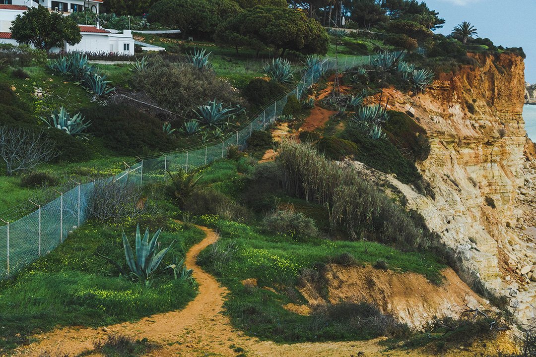 The red dirt path of the Lagos Cliff Hike