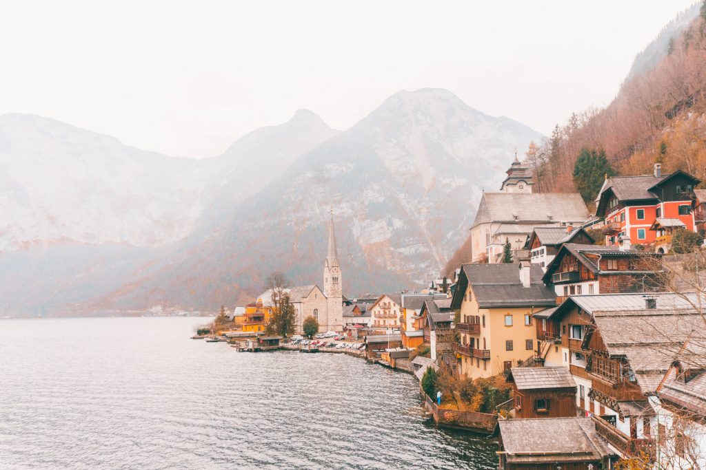 The postcard view of Hallstatt, Austria, with the town curving out into the lake