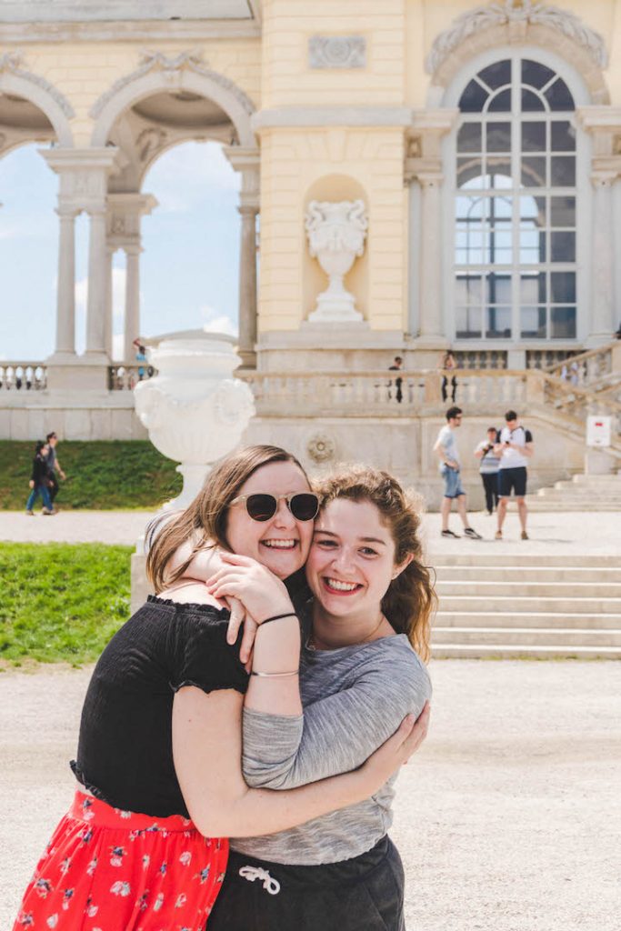 Angela and Addie standing in front of the Gloriette at Schonbrunn Palace in Vienna, Austria