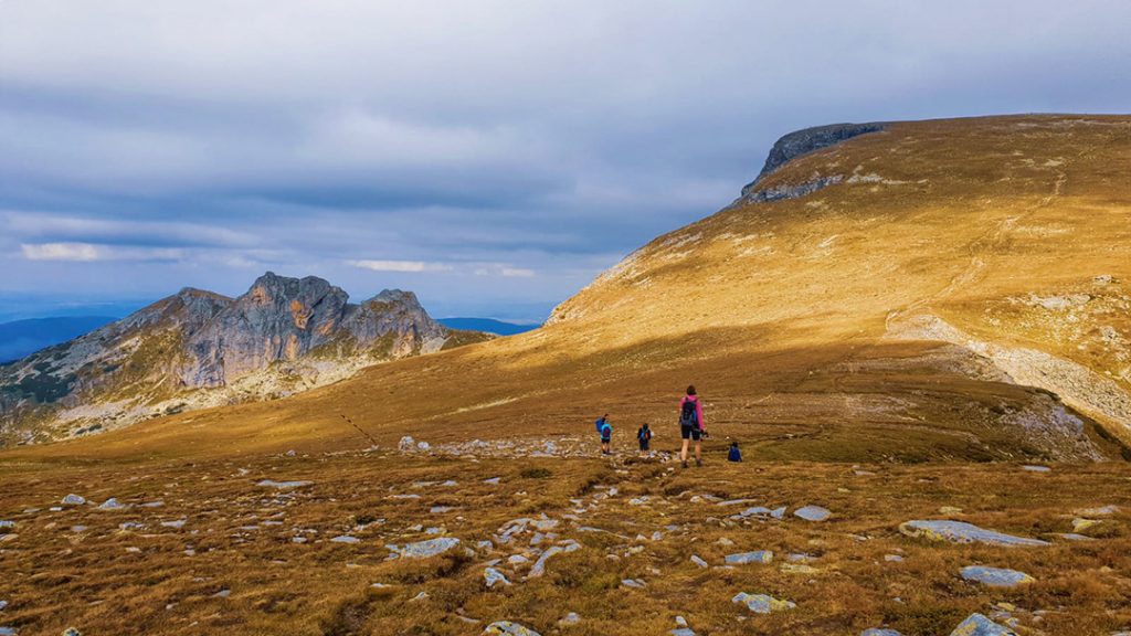 People hiking in the Rila Mountains, Bulgaria, Europe in the fall