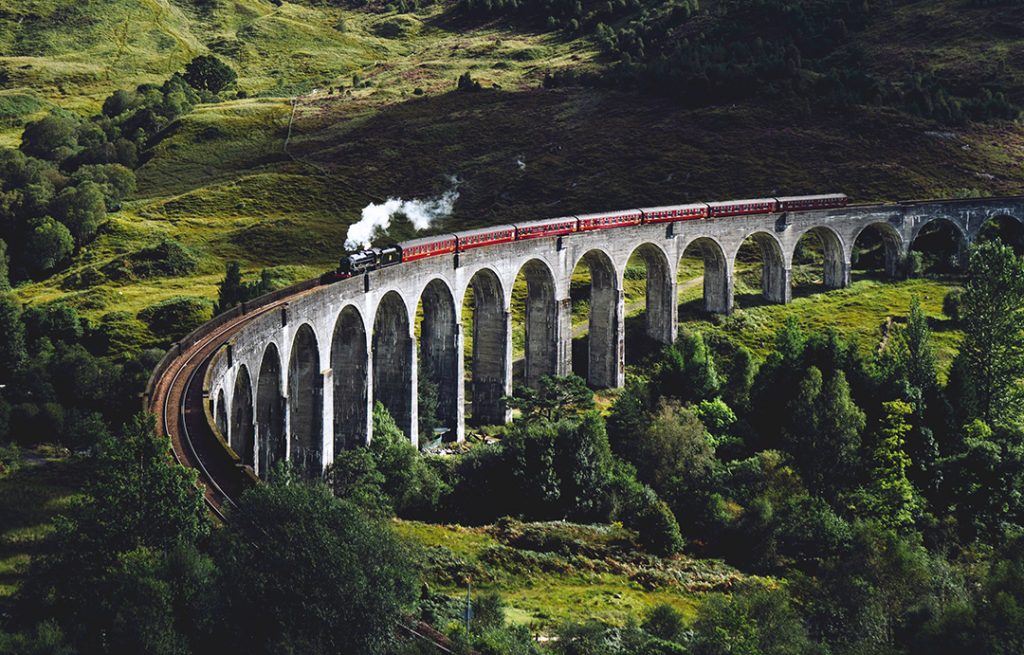 A train going over a viaduct in Europe