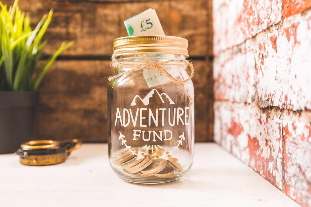 adventure fund mason jar - one of the best travel gifts for her!