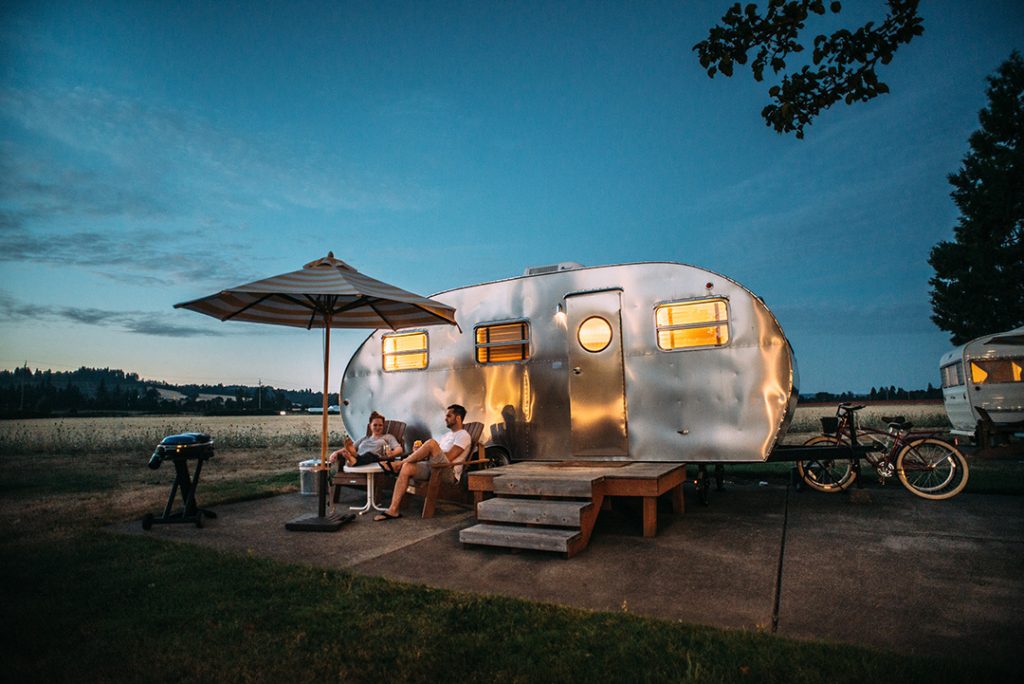 A metal camper - an Airbnb gift card makes a great travel gift for her!