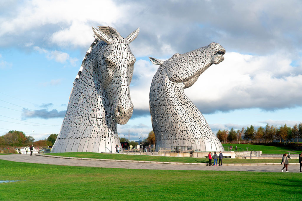 2 silver horse head statues
