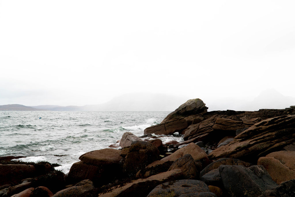 rocks rising from the ocean at elgol on the isle of skye