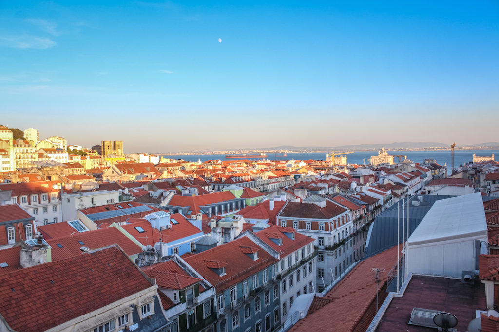 sunset over the red rooftops of Lisbon, Portugal