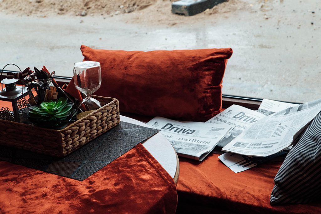 a cozy nook with local newspapers