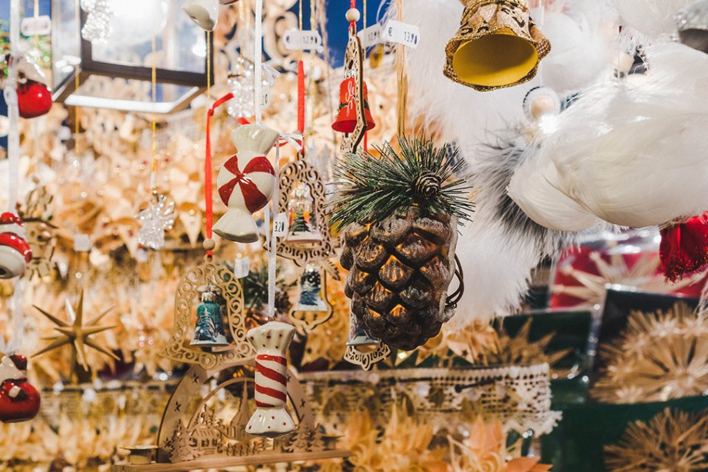 ornaments hanging from the roof of a stand