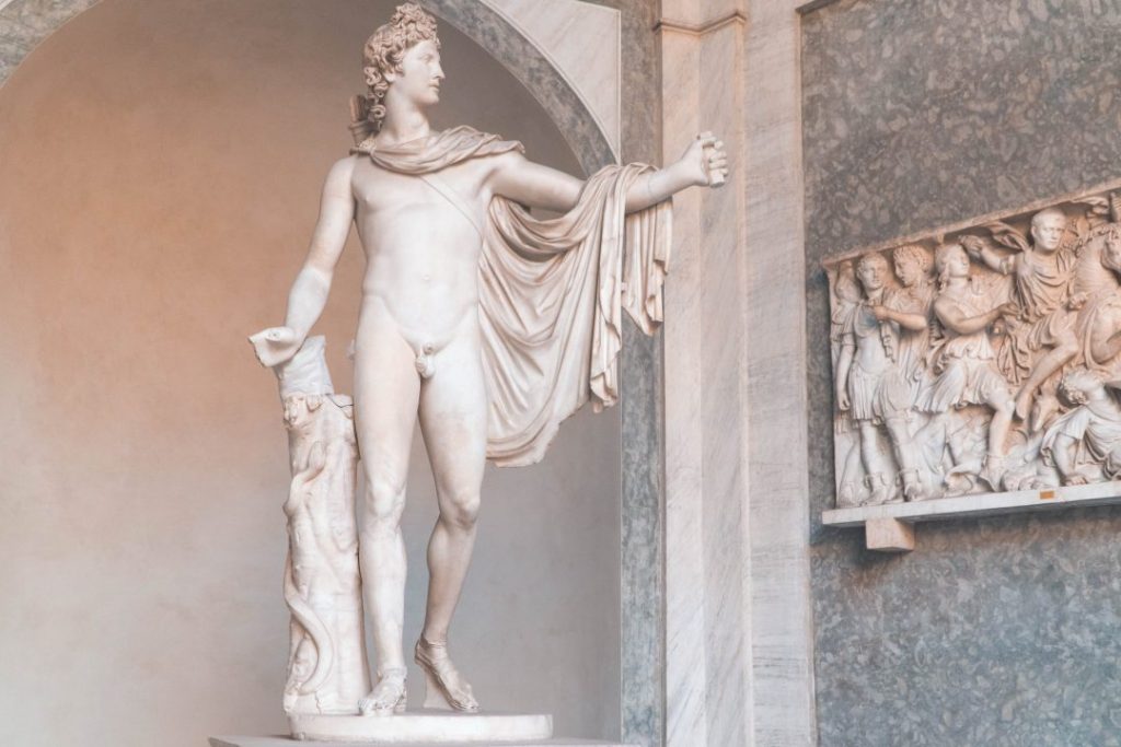 a marble statue holding its hand out