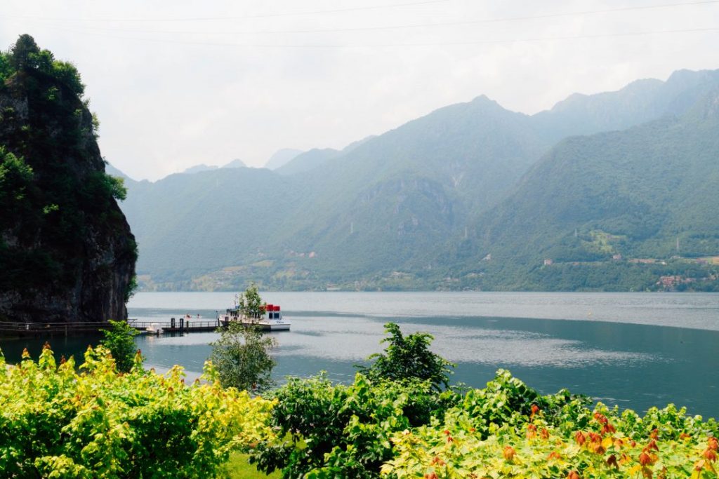 A small boat on a valley lake