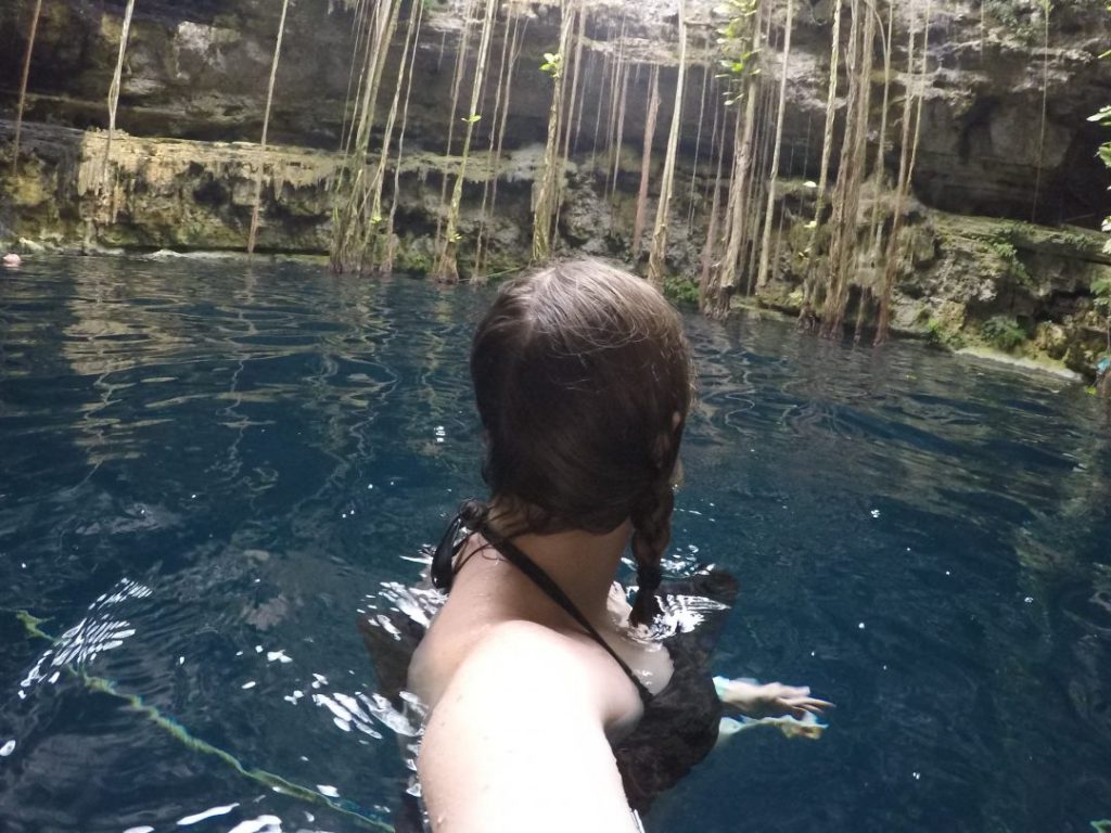 Addie swimming in Cenote San Lorenzo Oxman