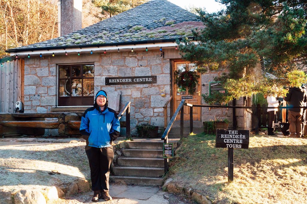 Daniel standing in front of the Cairngorm Reindeer Centre in Glenmore