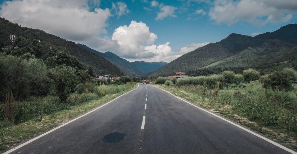 a road leading off into the distant mountains