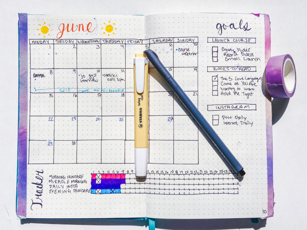 a june calendar in a bullet journal